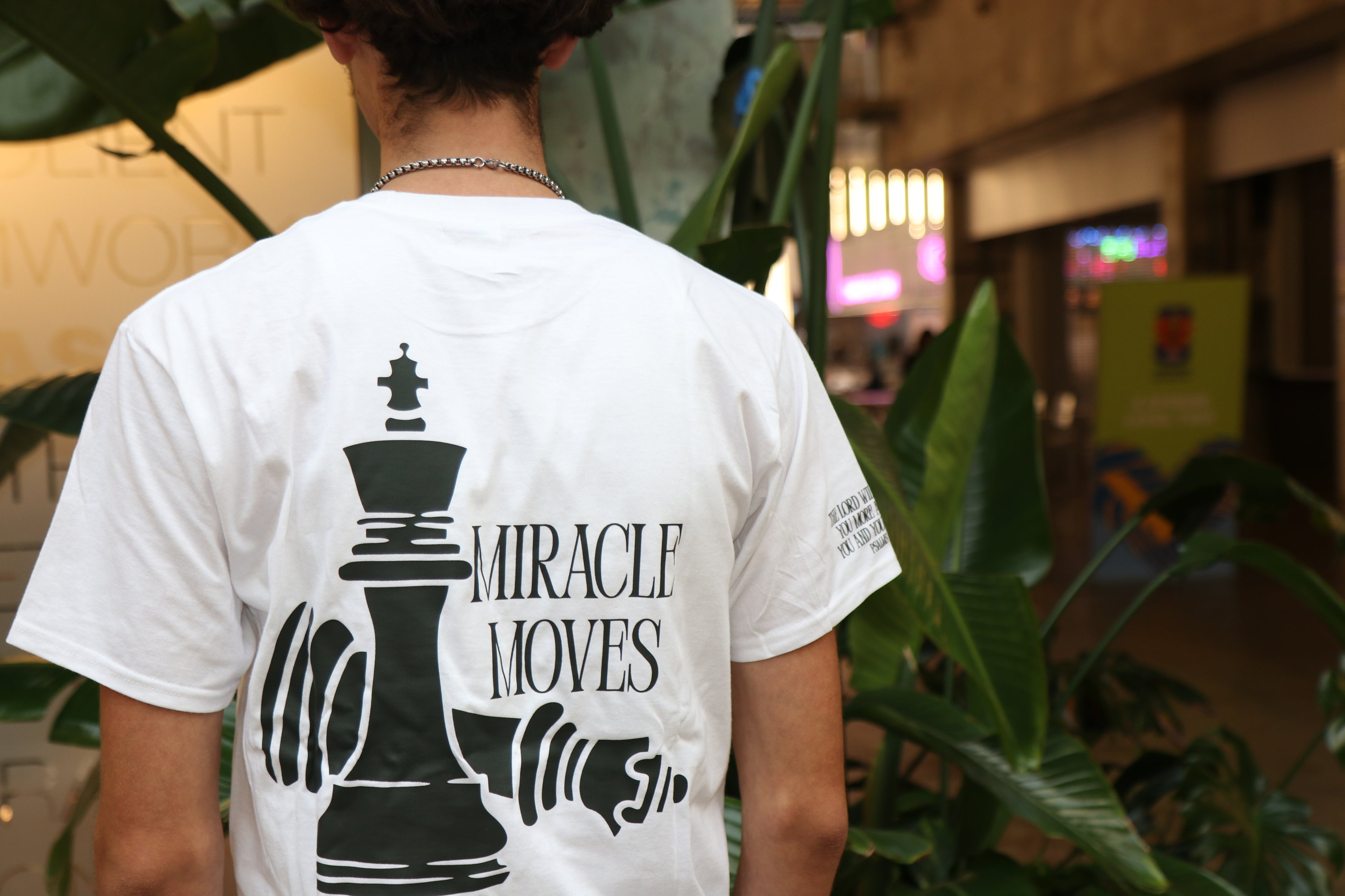 MIRACLE MOVES CHESS STYLE — T-SHIRT